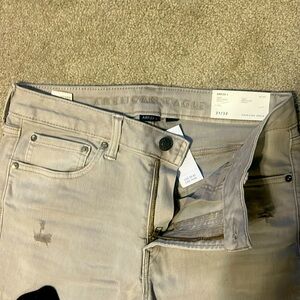 New with tags. American Eagle men’s frosty cream airflex jeans 31 x 32